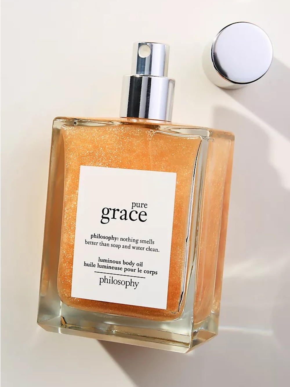 Philosophy Pure Grace Luminous Body Oil Glitter Gold Bottle for body & hair